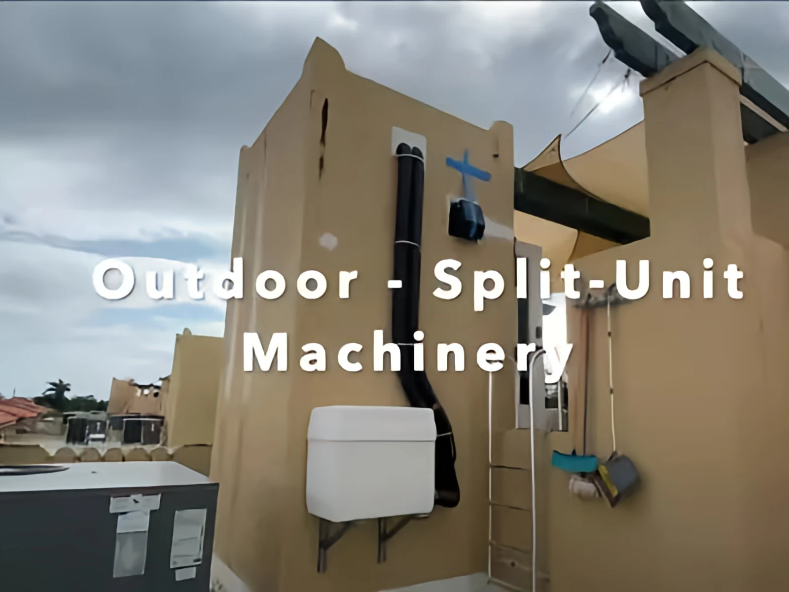 PVE split unit outdoor machinery housed in fiberglass enclosure mounted on exterior wall